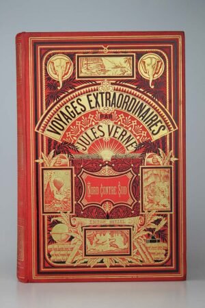 Jules Verne : Nord contre Sud. Paris, Hetzel, sd (1887, catalogue DS). Un volume grand in-8° relié pleine percaline d'éditeur à décor, cartonnage aux deux éléphants sur fond rouge. Intérieur très frais. Le cartonnage aussi. Très bel exemplaire de premier tirage.